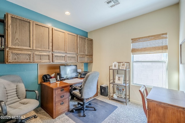 home office with light colored carpet