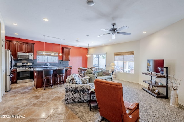 living room featuring ceiling fan