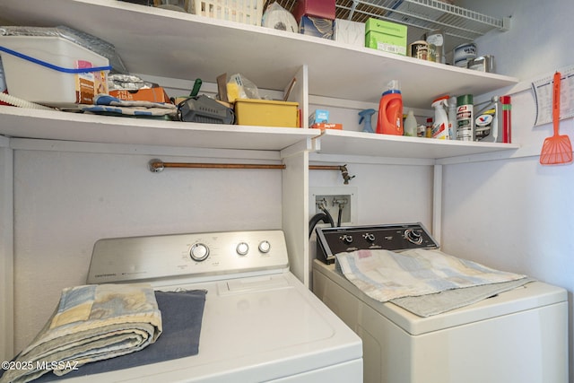 washroom featuring independent washer and dryer