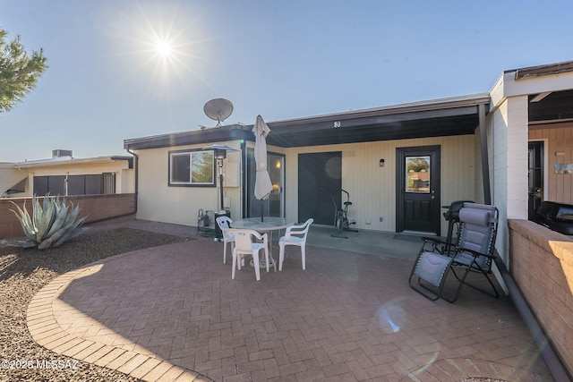 back of house with a patio area