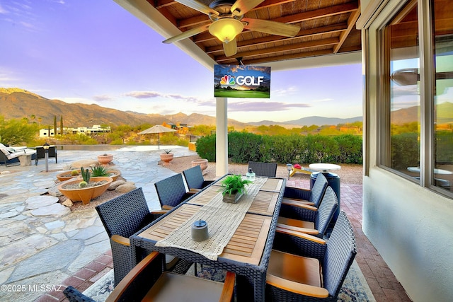 view of patio / terrace featuring ceiling fan and outdoor dining area