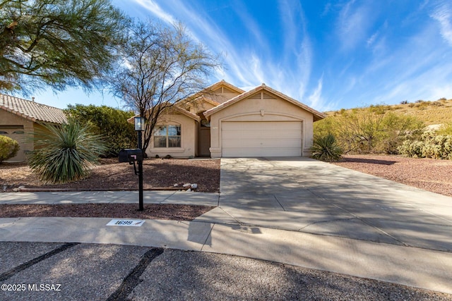 view of front of home featuring a garage