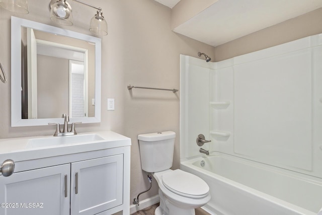 full bathroom featuring shower / washtub combination, vanity, and toilet