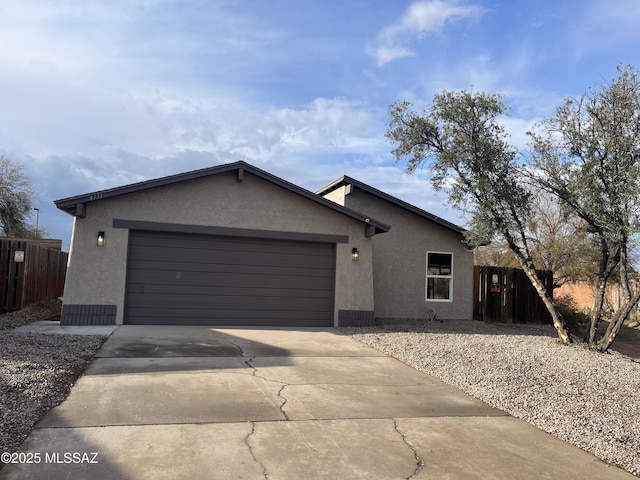 single story home with a garage