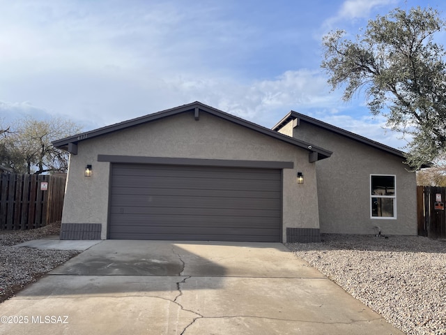 single story home featuring a garage