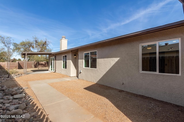 rear view of house with a patio area