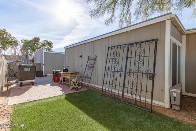 rear view of house with a patio area