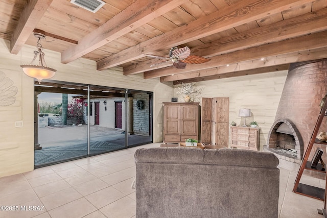 living room featuring wood ceiling, beam ceiling, and light tile patterned flooring