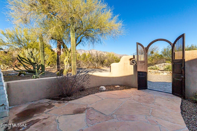 view of patio with a mountain view