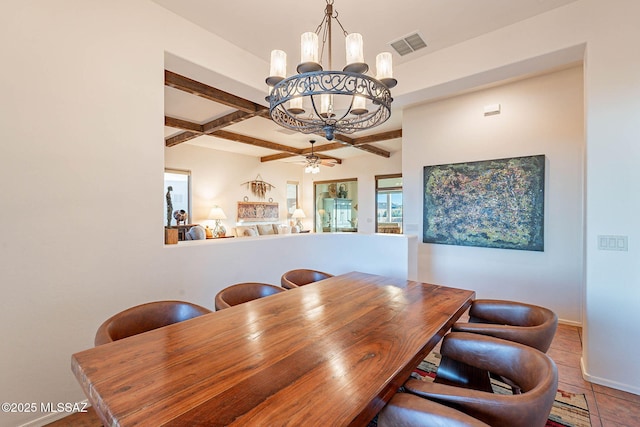 tiled dining space featuring coffered ceiling, ceiling fan with notable chandelier, and beam ceiling