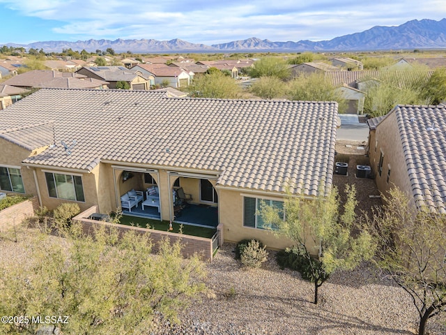 exterior space featuring a mountain view