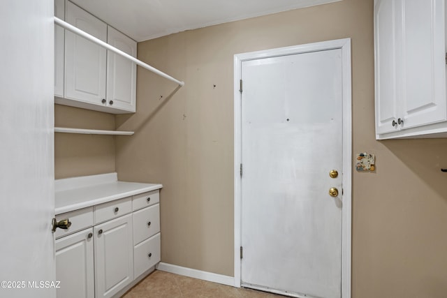 washroom with light tile patterned floors