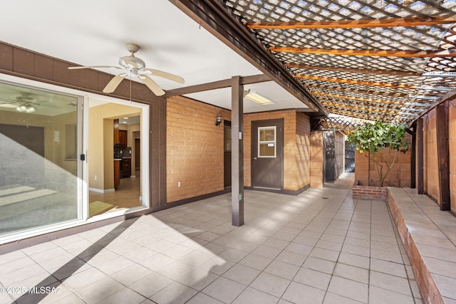 view of patio with ceiling fan