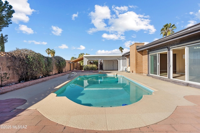 view of pool with a patio