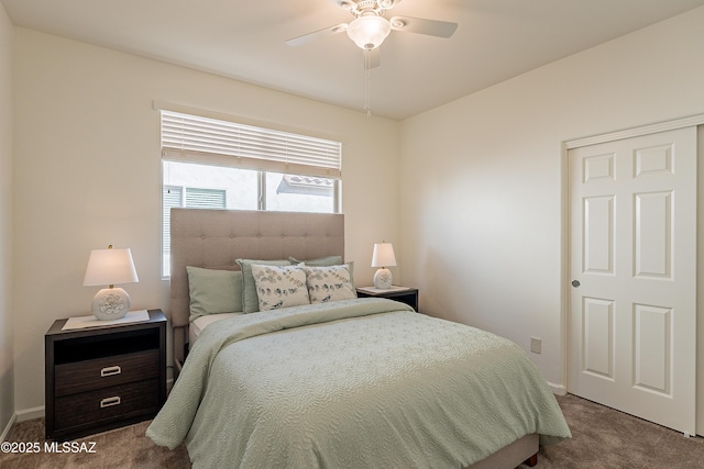 bedroom with ceiling fan and carpet flooring