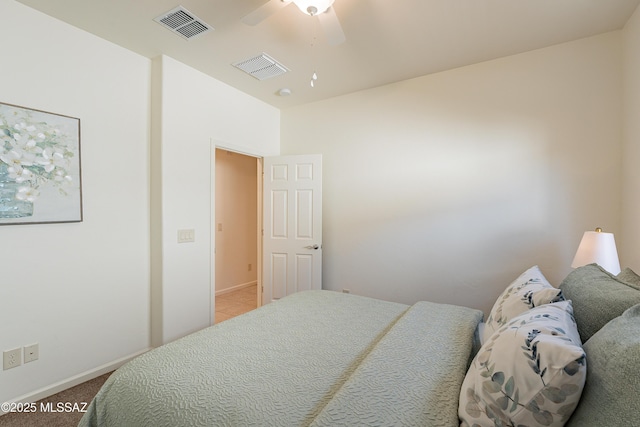 bedroom featuring ceiling fan and vaulted ceiling