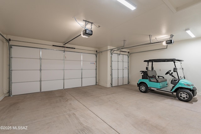 garage featuring a garage door opener