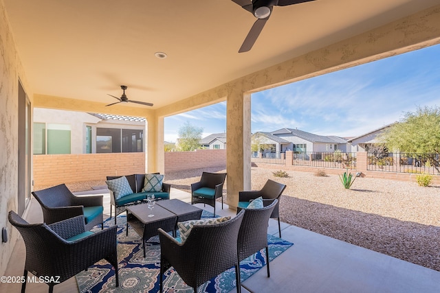 view of patio with an outdoor hangout area and ceiling fan