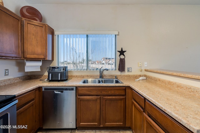 kitchen featuring appliances with stainless steel finishes and sink