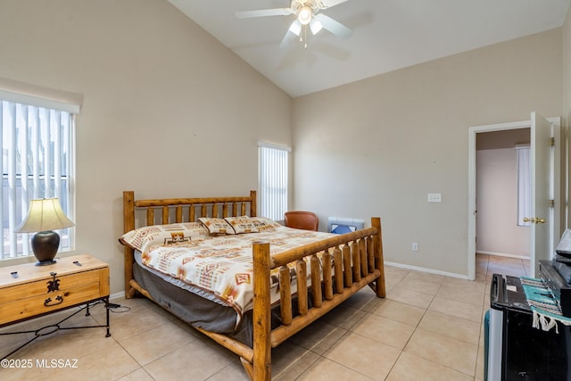 bedroom with light tile patterned flooring, ceiling fan, and high vaulted ceiling