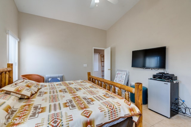 tiled bedroom featuring high vaulted ceiling and ceiling fan