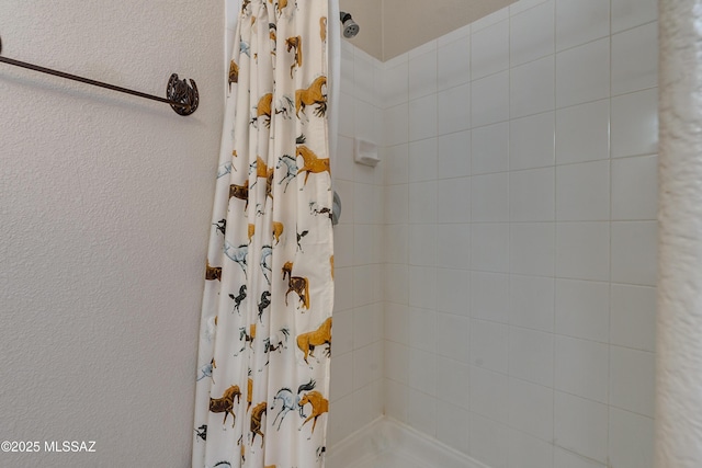 bathroom featuring walk in shower