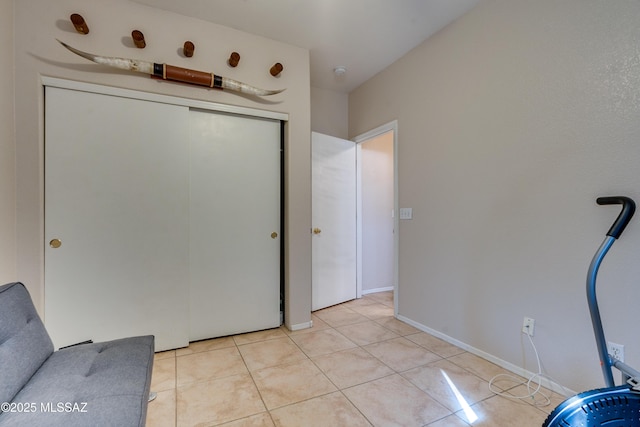 sitting room with light tile patterned floors