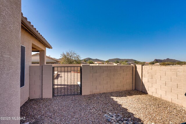 exterior space featuring a mountain view