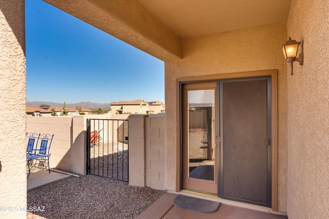 doorway to property with a mountain view