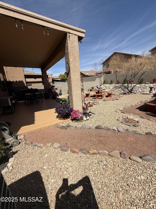 back of house featuring a patio area