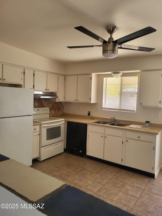 kitchen featuring sink, white appliances, light tile patterned floors, ceiling fan, and white cabinetry