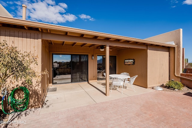 view of patio / terrace featuring ceiling fan