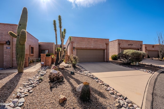 southwest-style home featuring a garage