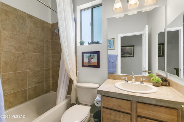 full bathroom with shower / bathtub combination with curtain, vanity, and toilet