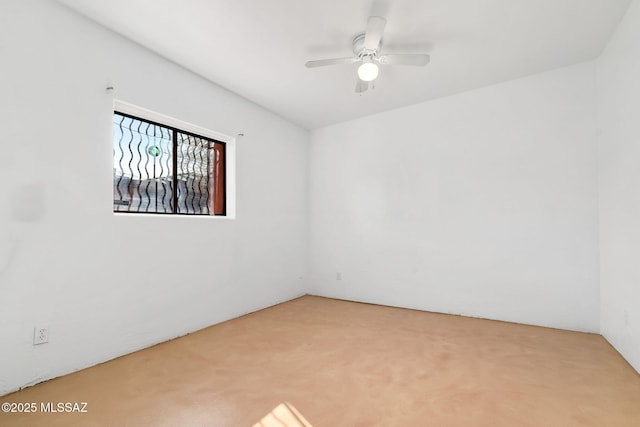 empty room with carpet floors and ceiling fan