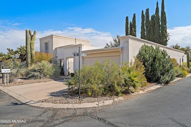 view of property exterior with a garage