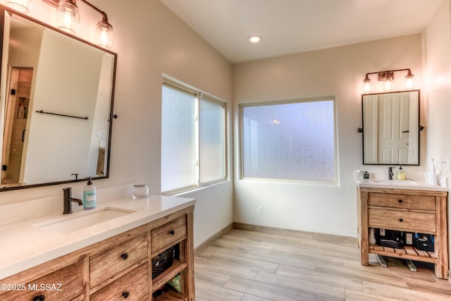 bathroom featuring vanity and wood-type flooring