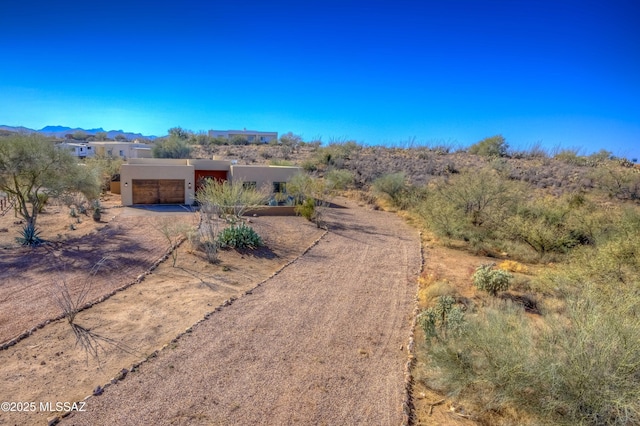 exterior space featuring a mountain view