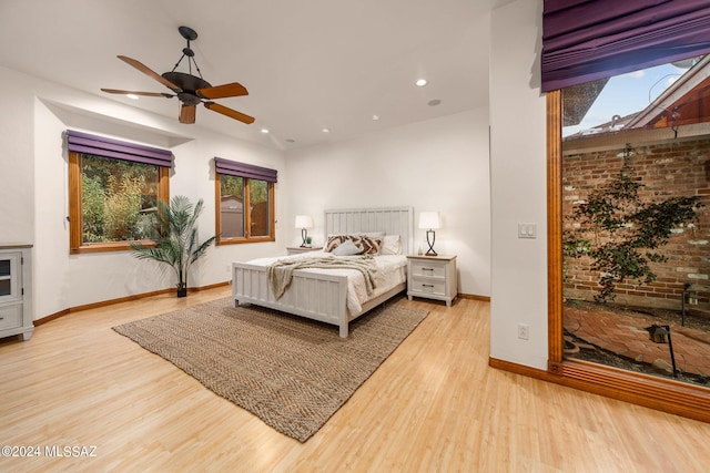 bedroom with recessed lighting, wood finished floors, a ceiling fan, and baseboards