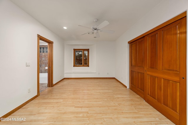 spare room with light wood-style floors, baseboards, a ceiling fan, and recessed lighting