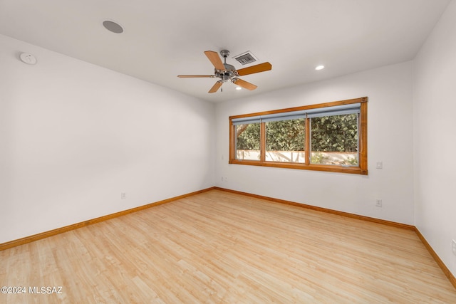 empty room with ceiling fan, recessed lighting, visible vents, baseboards, and light wood-style floors