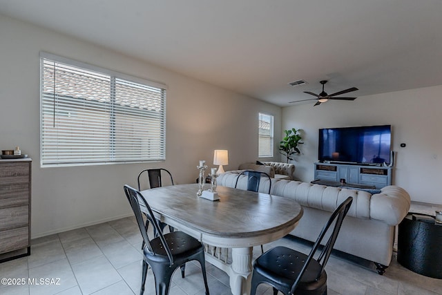 dining space featuring ceiling fan