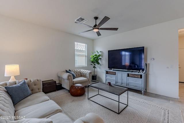 living room with ceiling fan