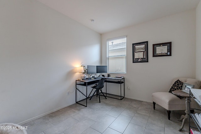 office area featuring lofted ceiling