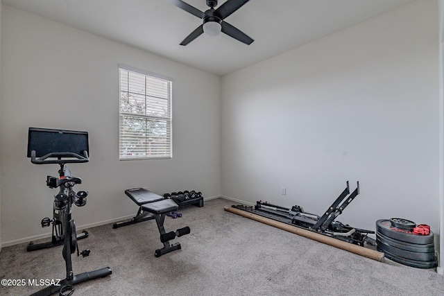 exercise room with carpet floors and ceiling fan