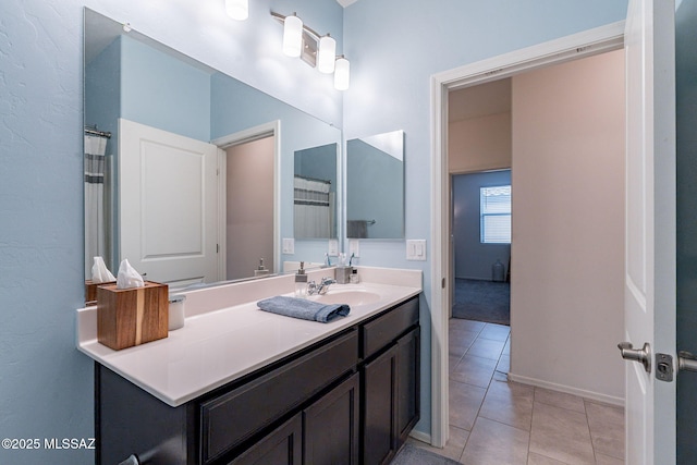 bathroom featuring vanity and tile patterned flooring