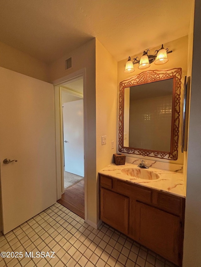 bathroom featuring vanity and tile patterned floors