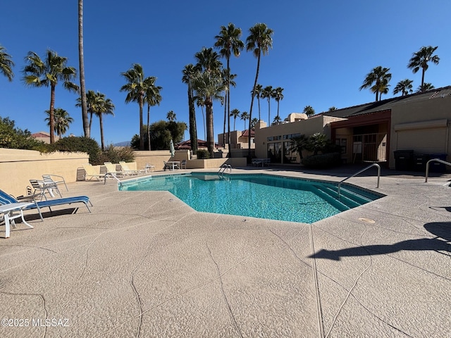 view of pool featuring a patio