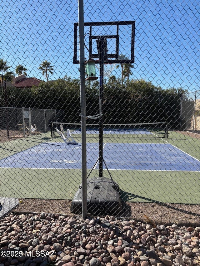 view of basketball court with tennis court