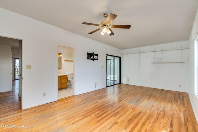 interior space featuring light hardwood / wood-style floors and ceiling fan